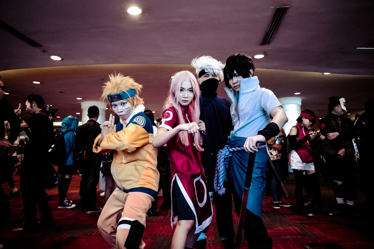 Cosplayers playing Naruto characters